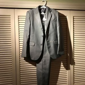 Boys 3-piece suit: pants, jacket and vest.